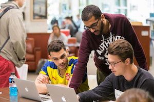 students working at computer